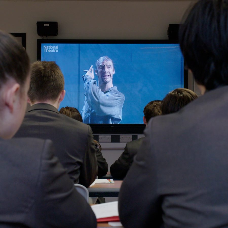 Classroom of pupils watching the NT Collection