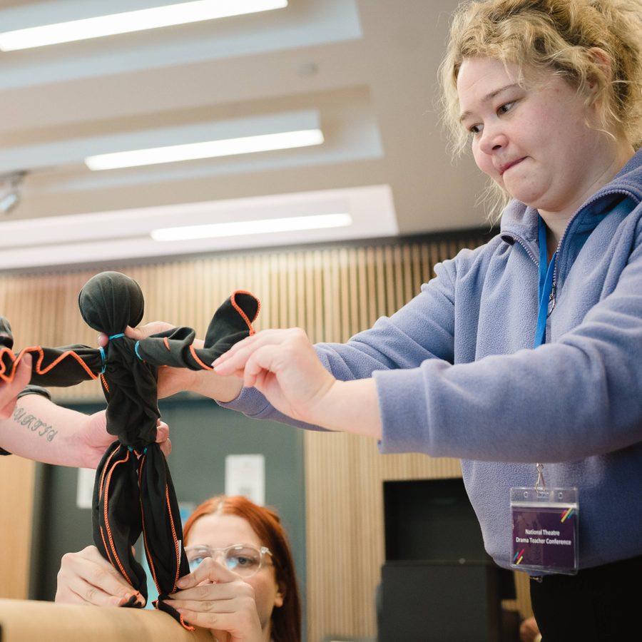 Two teachers manipulating a puppet, 2023 Drama Teacher Conference